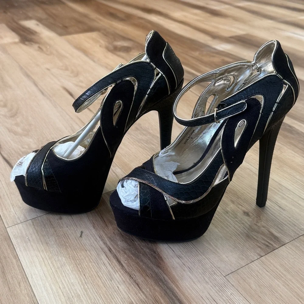 bebe Clarissa Black and Gold Platform High Heel Sandals